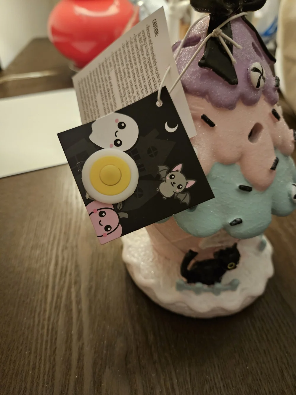 Whimsical Pastel Fairy House Figurine with Black Cat